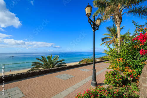 Morro Jable promenade along sea on Jandia beach, Fuerteventura, Canary Islands, Spain photo