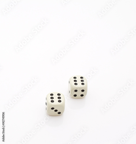 Two dice and number six double isolated on white background. A place for your text and images.