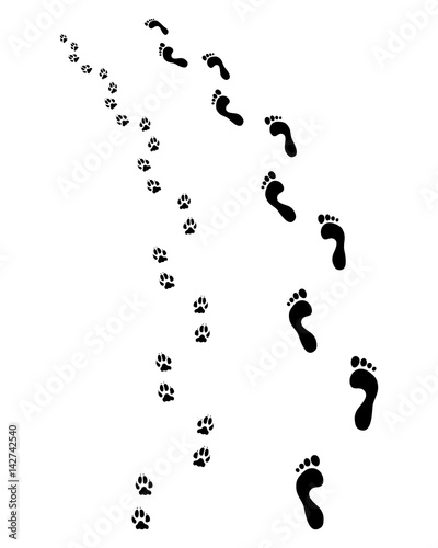 Prints of human feet and dog paws, turn left
