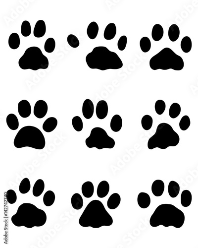 Black footprints of rabbits on a white background