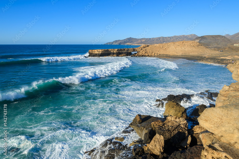 Ocean waves on La Pared beach on western coast of Fuerteventura, Canary Islands, Spain