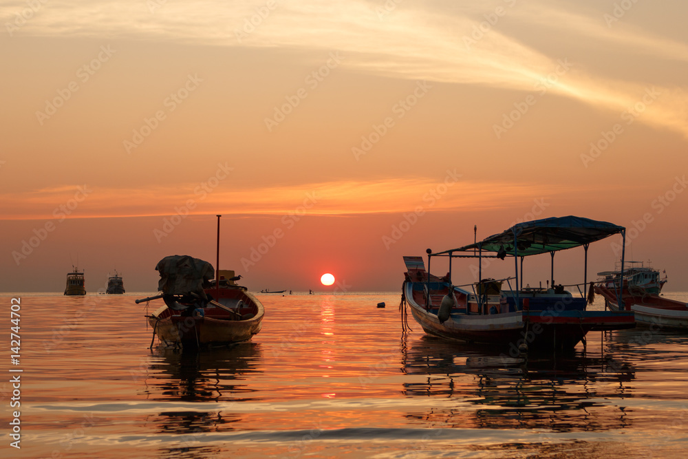 Long Tail boats at sunset at Koh Tao, Thailand Long Tail boats at sunset at Koh Tao, Thailand