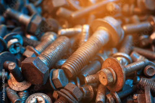 old rusty bolts and nuts background
