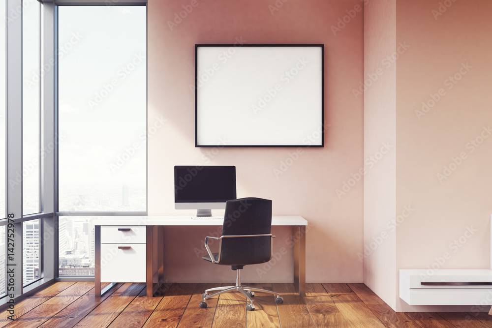 Pink wall workplace with poster