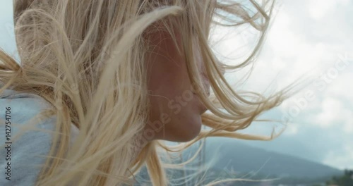 Beautiful girl hair closeup on sailboat in ocean on luxury lifestyle happy adventure travel vacation slow motion