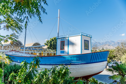 Beautiful boat very well preserved in a village in the south of Spain photo