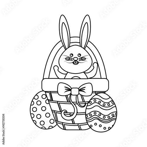 figure rabbit easter inside of hamper and eggs outside