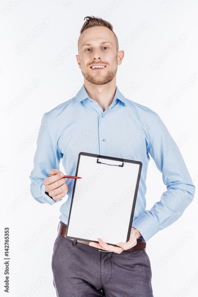 bearded man holding a folder of document and pointing his pen at it. human emotion expression and lifestyle concept. image on a white studio background. bearded man holding a folder of document and pointing his pen at it. human emotion expression and lifestyle concept. image on a white studio background.