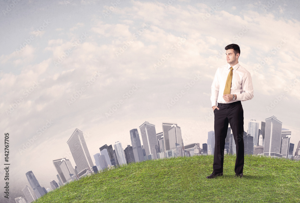 man standing in front of city landscape man standing in front of city landscape