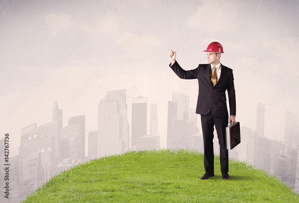 man standing in front of city landscape man standing in front of city landscape