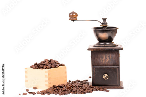 manual coffee grinder and coffee bean on white background