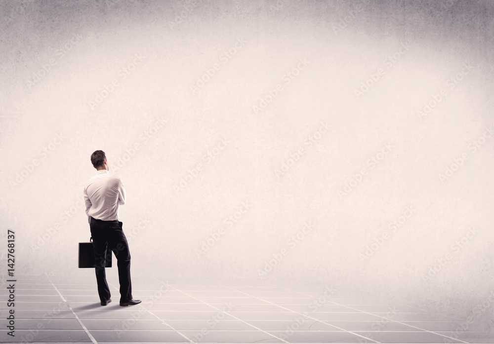 Business person standing in empty space Business person standing in empty space