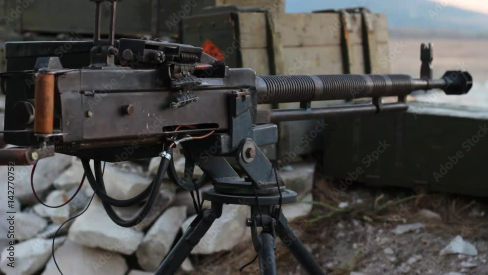 Heavy machine gun in the trenches. War in real time Heavy machine gun in the trenches. War in real time