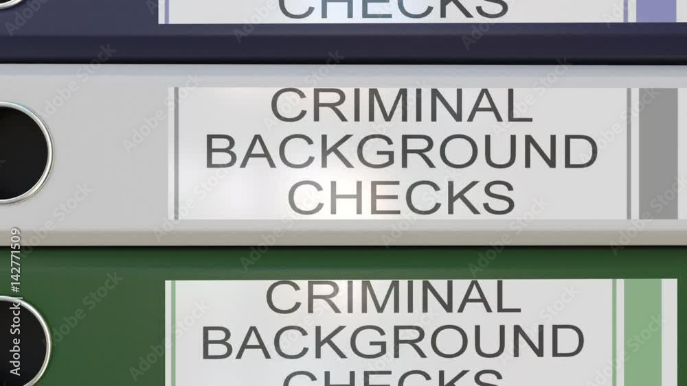 Vertical stack of multicolor office binders with Law suits tags Vertical stack of multicolor office binders with Law suits tags