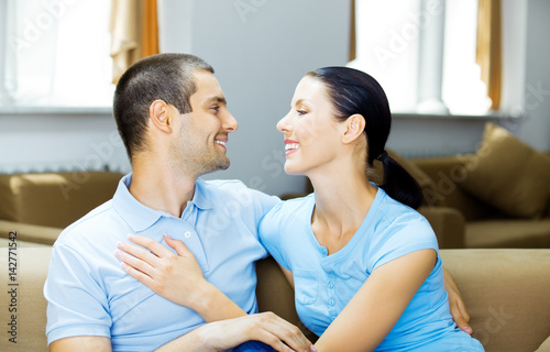 Young happy couple at home © vgstudio