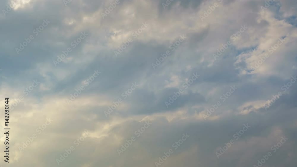 Beautiful cloudscape timelaspe with large, building clouds and sunrise breaking through cloud mass. Beautiful cloudscape timelaspe with large, building clouds and sunrise breaking through cloud mass.