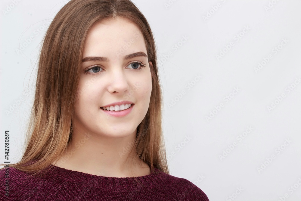 Portrait of a young attractive woman in red sweater Portrait of a young attractive woman in red sweater