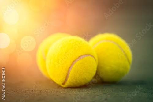 macro three tennis balls on court © Myst