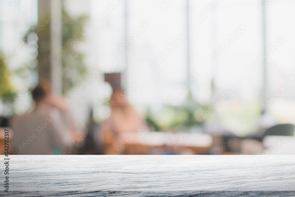 Stone table top and blurred restaurant interior background - can used for display or montage your products. Stone table top and blurred restaurant interior background - can used for display or montage your products.