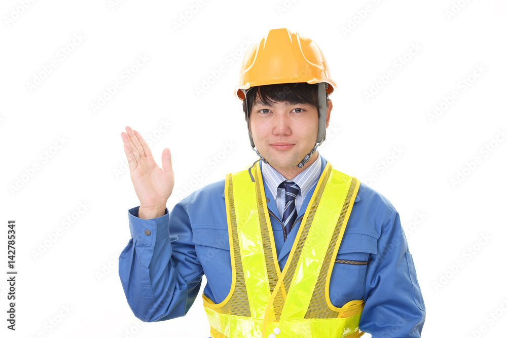 案内する労働者