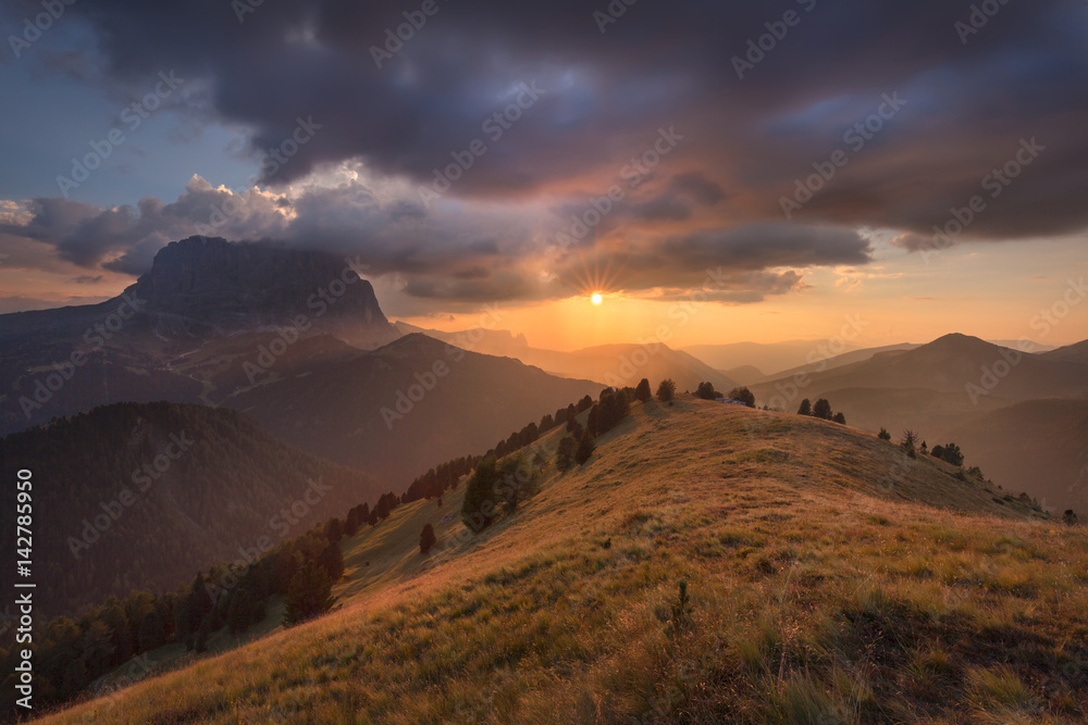 Idyllic mountain landscape image towards the setting sun Idyllic mountain landscape image towards the setting sun