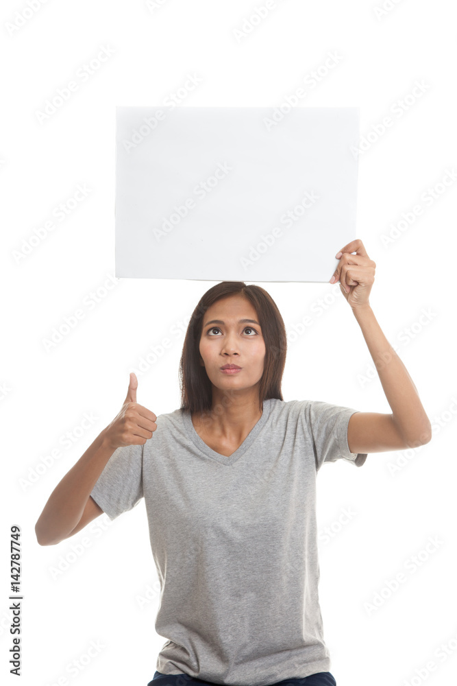 Young Asian woman show thumbs up with  white blank sign.