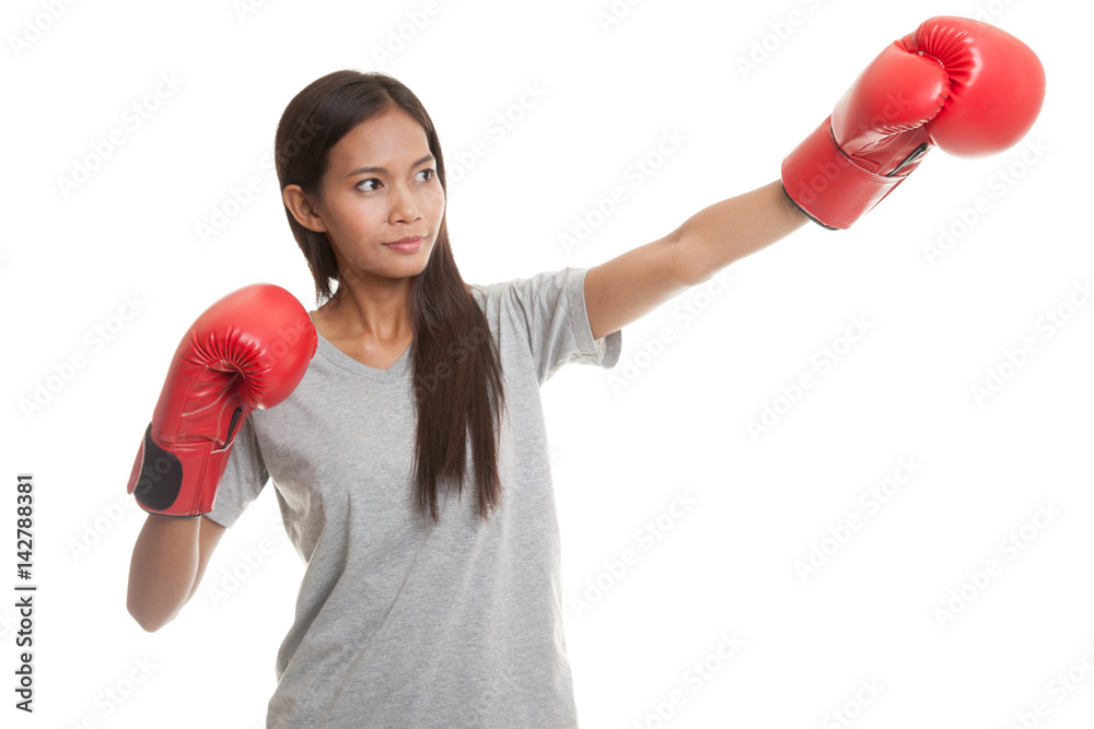 Young Asian woman with red boxing gloves. Young Asian woman with red boxing gloves.