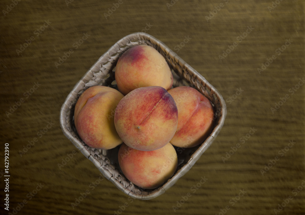 Peach fruit in a basket Peach fruit in a basket
