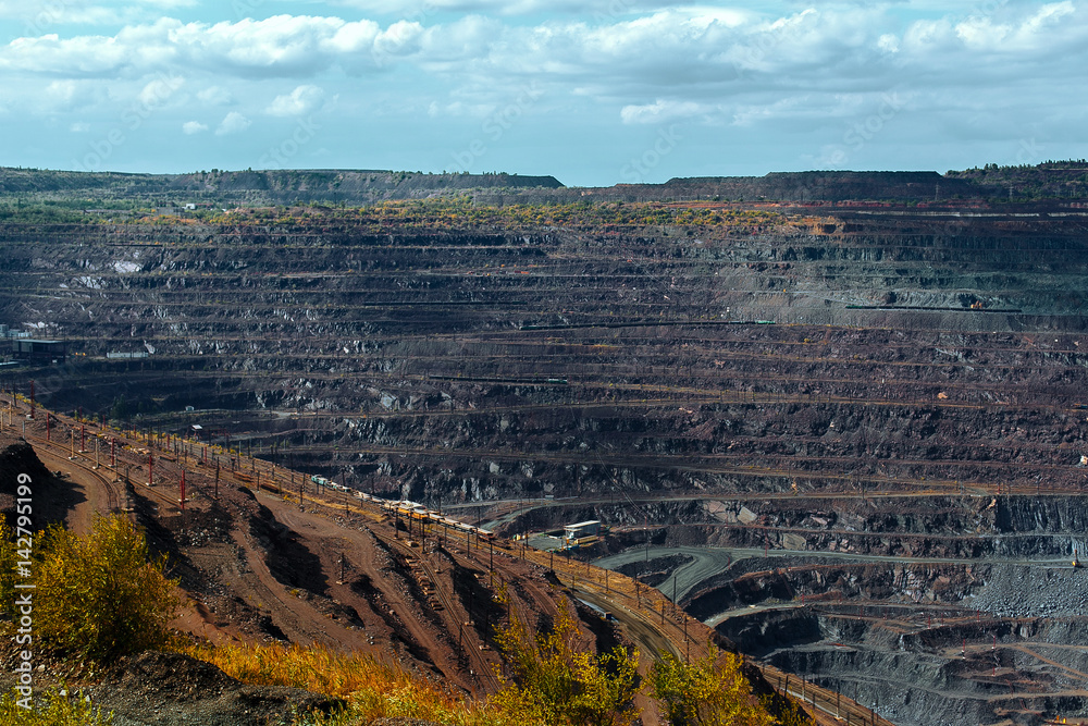 Naklejka premium large quarry mining of iron ore