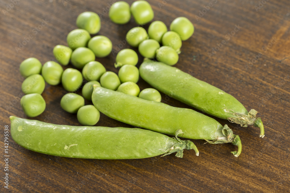 pea pods and peas on the table pea pods and peas on the table