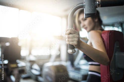 Close up woman's hand fitness in the gym. photo