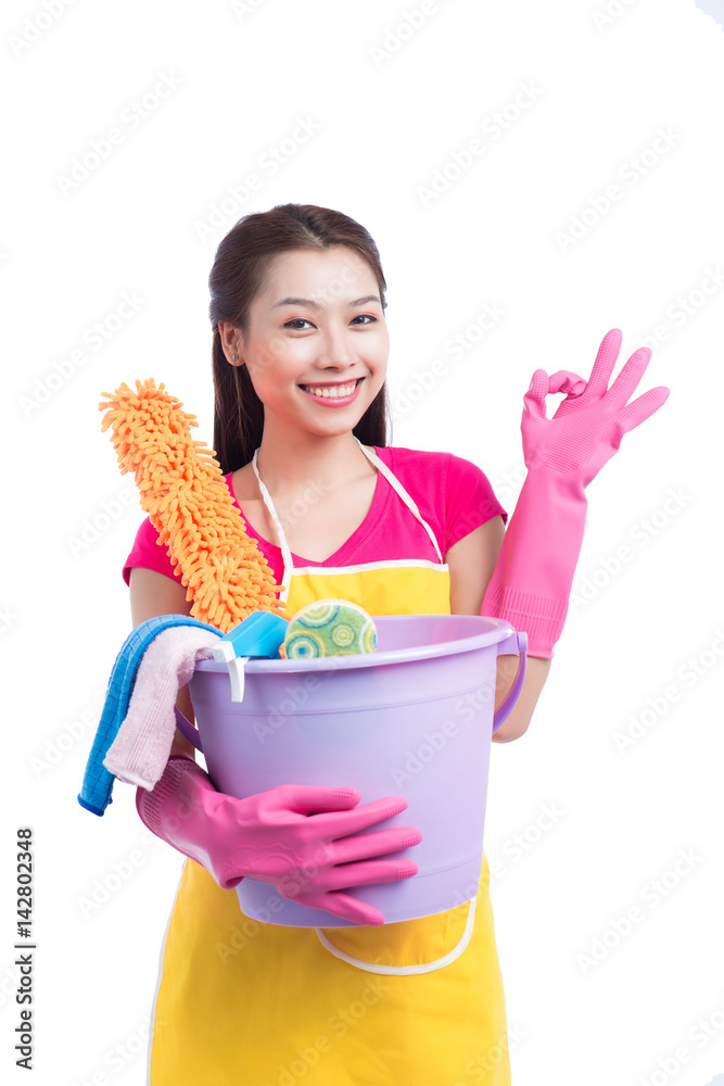 Smiling young cleaning asian lady with pink rubber gloves showing ok sign with thumbs up over white Smiling young cleaning asian lady with pink rubber gloves showing ok sign with thumbs up over white