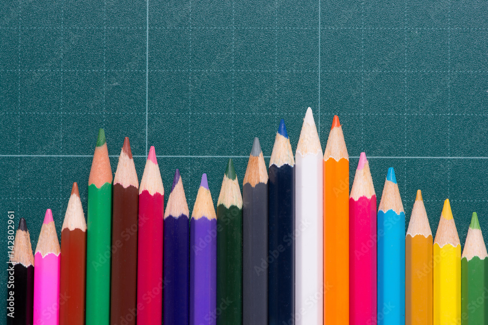 Back to school supplies. Books and chalkboard. Back to school supplies. Books and chalkboard.