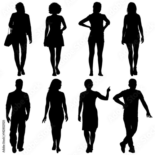 Black silhouette group of people standing in various poses