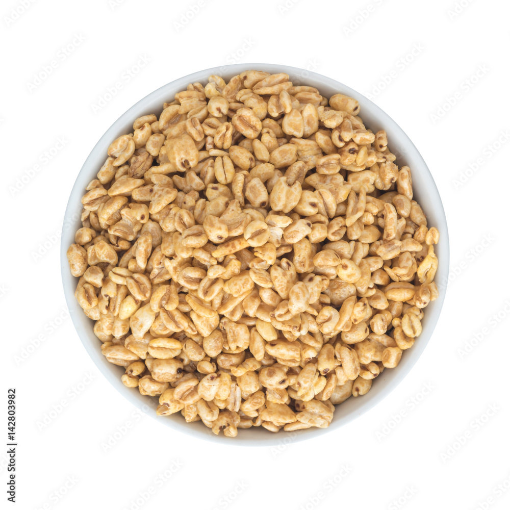 Heap of Puffed Wheat Snack in White Round Bowl Isolated