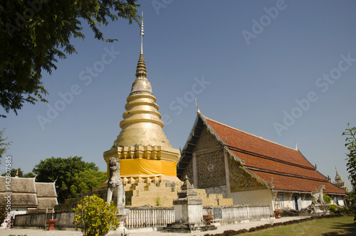 Gloden chedi for people respect praying and visit at Wat Phra that chom ping