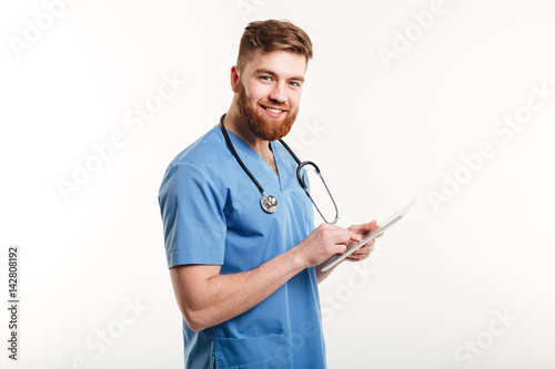 Portrait of a cheerful smiling medical doctor or nurse
