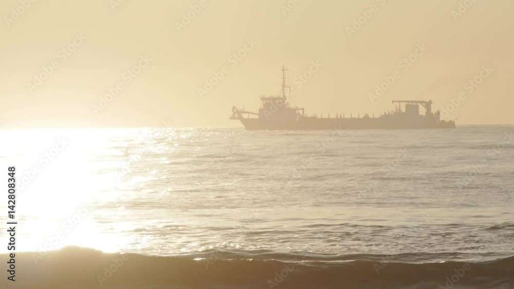 Sunrise ship silhouette on the Durban coast line - 4K Sunrise ship silhouette on the Durban coast line - 4K