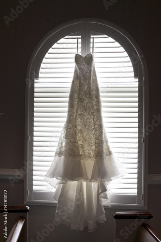 Wedding Dress in Church Window