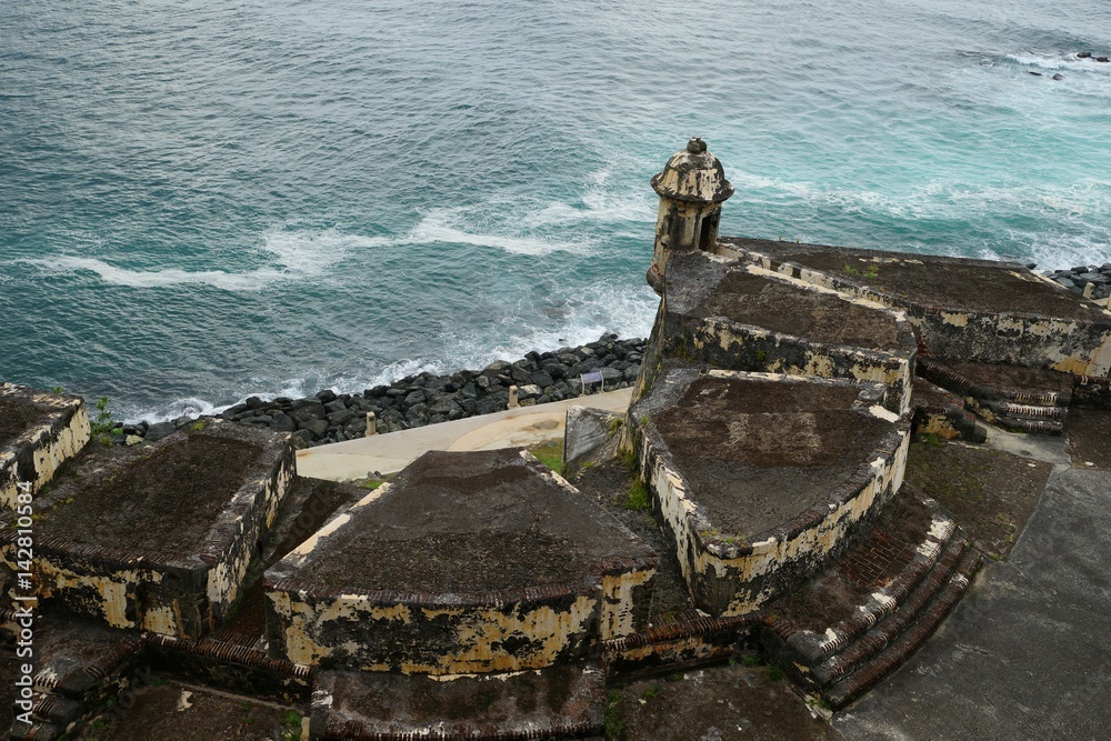 Top view of Paseo del Morro, San Felipe del Morro Fortress, Puerto Rico with part of the stone wall on the foreground