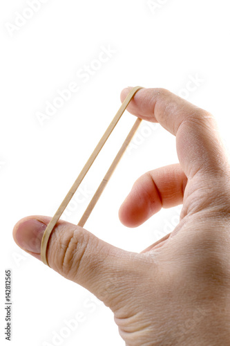 Male hand stretching rubber band