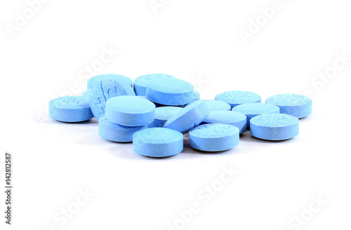 Pile of light blue pills