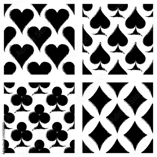 Vector set of seamless grunge patterns. Grungy graphic illustration of sign of playing card with ink blot, brush strokes. Endless background. Series of gaming and gambling seamless vector patterns.