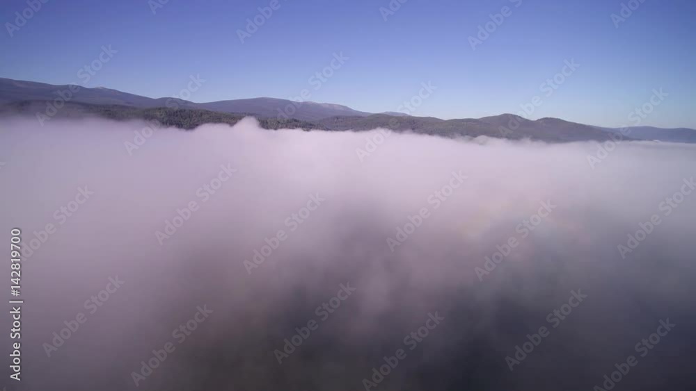 Lake view from the air. In the clouds. Mountains, Karkonosze Lake view from the air. In the clouds. Mountains, Karkonosze