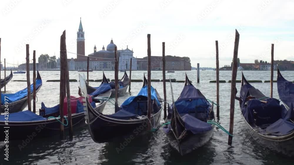 Venice, Italy - Parked gondolas on the Grand Canal Venice, Italy - Parked gondolas on the Grand Canal