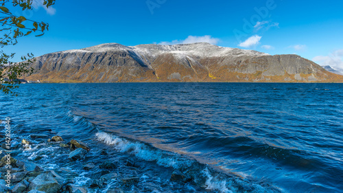 Autumn view of the Big Vudyavr lake in the Khibiny (Hibiny) mountains. Kirovsk, Murmansk region, Russia. 