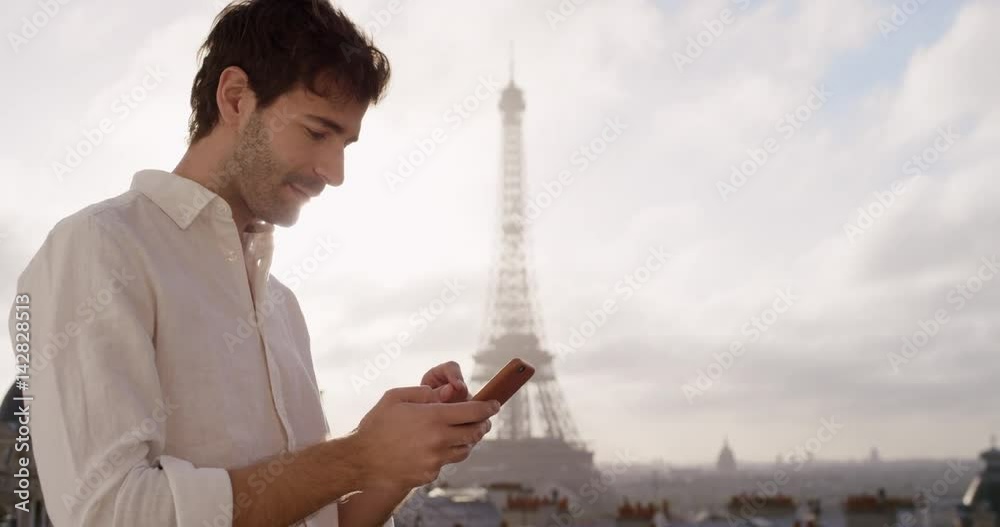 Travel man using digital tablet technology view from hotel terrace breakfast vacation
