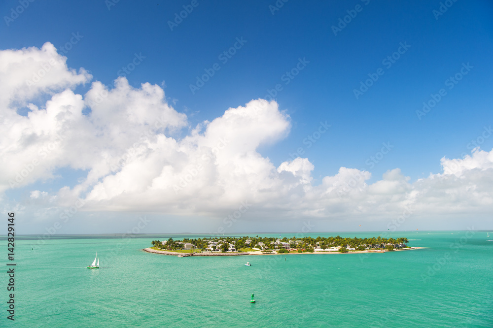 touristic yachts floating near green island at Key West, Florida