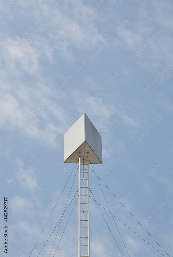 triangle board with high iron structure on building rooftop in sunny day triangle board with high iron structure on building rooftop in sunny day