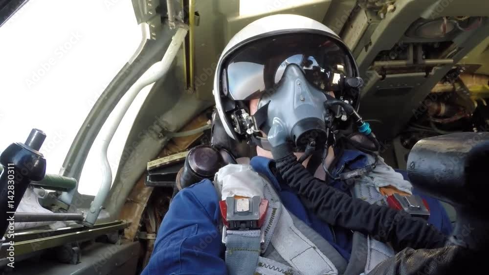 Pilot in helmet and gloves Pilot in helmet and gloves